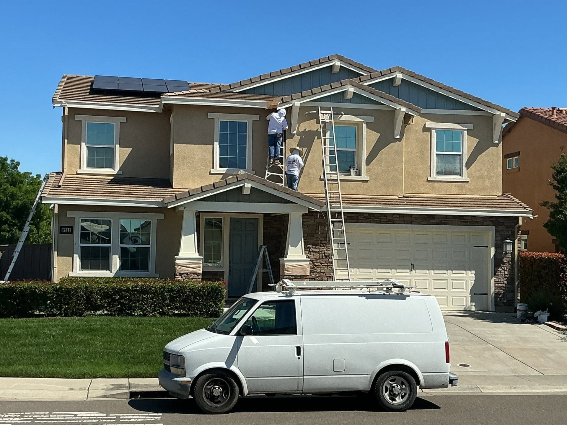 Velasco's Painting van and crew on a craftsman exterior repaint