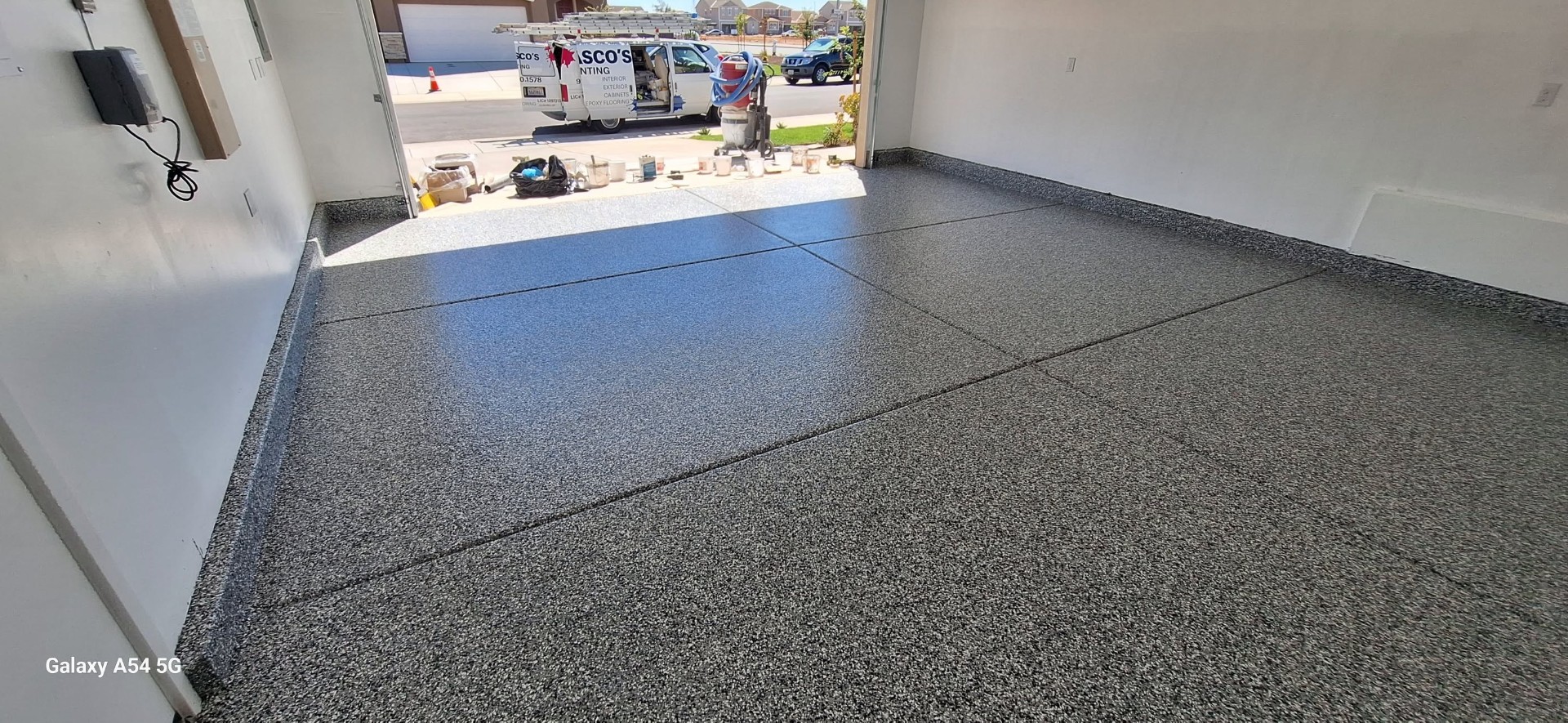 2-car garage epoxy with dark flake in Sacramento